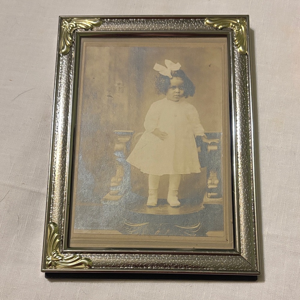 Original child studio portrait of a young African American girl, 1910 era